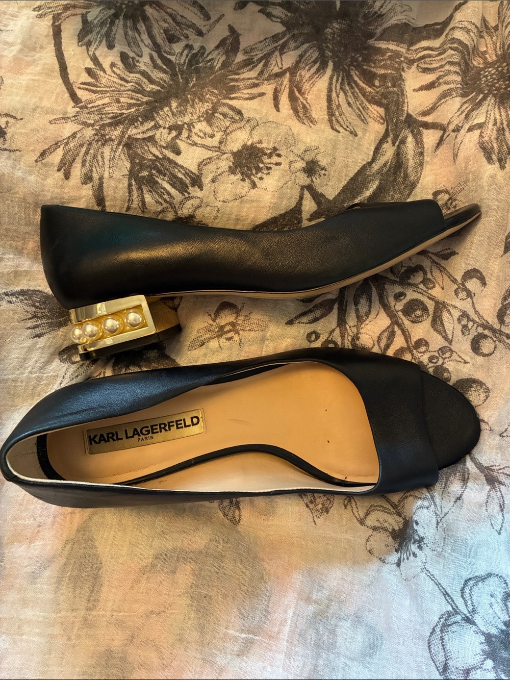 Karl Lagerfeld Black Leather Peep-Toe Flats with Gold Pearl-Accented Heel.